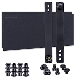 May include: A set of black hardware for attaching straps to a fabric surface. The set includes two black straps with metal buckles, 12 black metal eyelets, and four black screws with nuts.