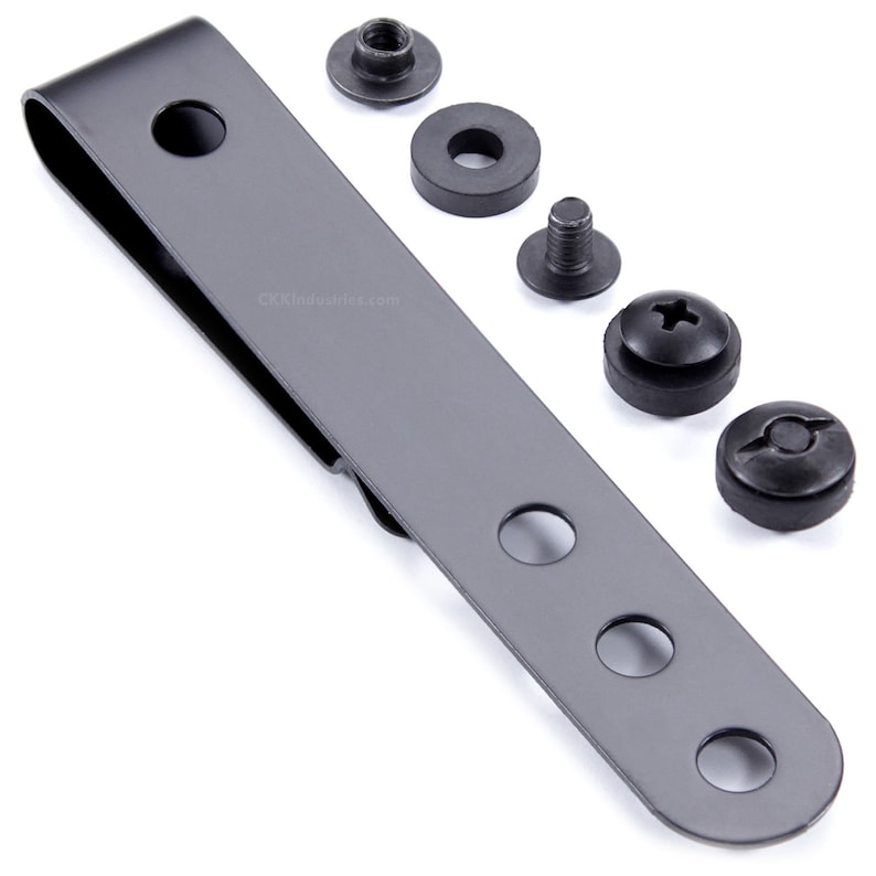 May include: A black metal belt clip with four holes and a spring-loaded clip. It comes with four black screws and washers.