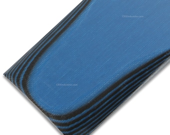 May include: A close-up of a blue and black wood grain sheet. The sheet has a smooth, polished surface and a natural wood grain pattern.