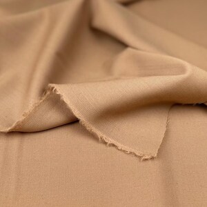 Tessuto fresco di lana colore marrone , tessuto al metro tagliato su misura, ideale per pantaloni o patchworking, bi elastico