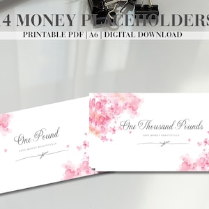 May include: A set of printable A6 money placeholders featuring pink watercolor floral accents. The text reads 14 MONEY PLACEHOLDERS, PRINTABLE PDF | A6 | DIGITAL DOWNLOAD, One Pound, One Thousand Pounds, and SAVE MONEY BEAUTIFULLY.