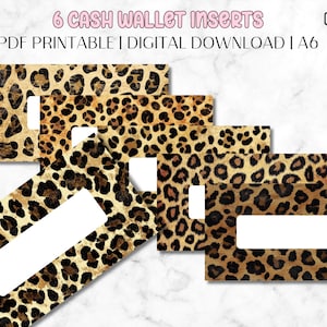May include: Six cash wallet inserts with a leopard print design. The inserts are rectangular with a white rectangular window. The text "6 CASH WALLET INSERTS" is at the top, along with "PDF PRINTABLE | DIGITAL DOWNLOAD | A6".