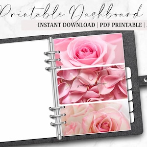 May include: A black binder with white pages and floral inserts featuring pink roses and petals. The binder includes the text "Printable Dashboard" and "Instant Download | PDF Printable | A6".
