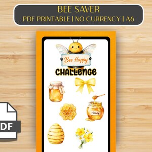 Könnte beinhalten: Ein digitaler PDF-Druck mit einem Bienenthema. Das Design umfasst eine Cartoon-Biene, Honigtöpfe, eine Honigwabe und die Worte "Bee Happy Challenge". Der Text "BEE SAVER PDF PRINTABLE I NO CURRENCY I A6" steht oben.