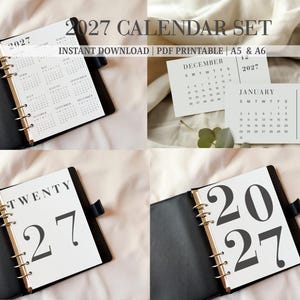Può includere: Un set di calendario 2027 con pagine stampabili per agende A5 e A6. Il set include una panoramica annuale, schede mensili per dicembre e gennaio e pagine di titolo con il testo 2027 e TWENTY 27 in un carattere serif di colore nero.