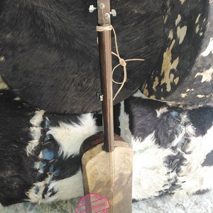 Petits instruments Marocain Gnawa, instruments Gnawa, musique soul Guembri basse Gnawa