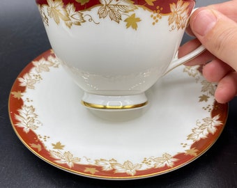 Vintage Royal Doulton Winthrop-theekop en schotel: porselein met rood bladgoud