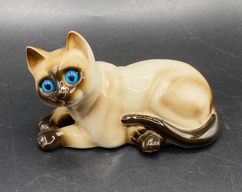 Vintage McCameron & Sons, Ceramic Laying Down Siamese Cat with Blue Glass Eyes