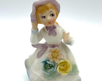Figurka kobiety z porcelany biskwitowej z aplikacją kwiatową, Japonia #24400