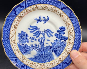 Blauw-wit porseleinen bord met echt oud wilg: cabines, gemaakt in Engeland