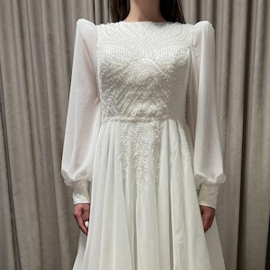 A-Line Wedding Dress with V-Neckline, Puff Sleeves, Beaded Appliques, and Flowing Glitter Tulle Skirt  “Olese”