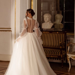 A-line Wedding Dress Illusion Neckline V-neck Long Sleeves High Neck Sheer Back Corset Long ...