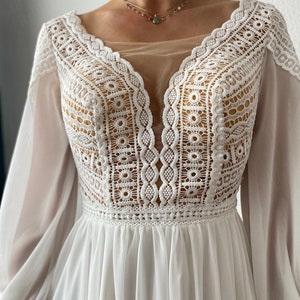 Boho A-Line Wedding Dress Plunging Neckline Long Bishop Sleeves Open Back Chiffon Floor-Length Skirt “Skaiste”