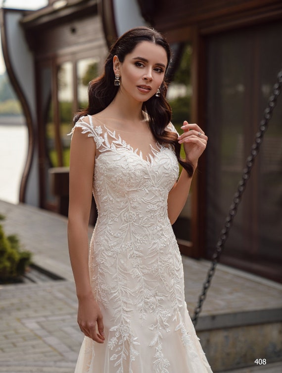 A line fit shop and flare wedding dress
