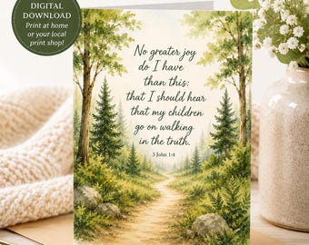 May include: A greeting card featuring a watercolour illustration of a forest path with green trees and rocks. The text reads: No greater joy do I have than this: that I should hear that my children go on walking in the truth. 3 John 1:4.