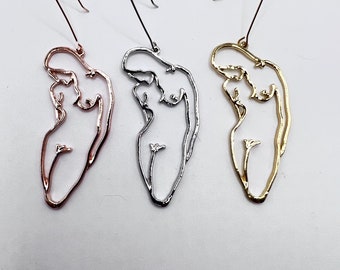 Oorbellen silhouet vrouw