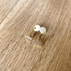 Painless U clip earrings in gold with stone detail