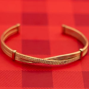Vintage Gold Tone Cuff Bracelet by Avon 7 1/2 Inches - O12
