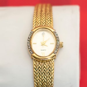 Vintage Minimalist Stainless Steel Wrist Watch by Avon - O22