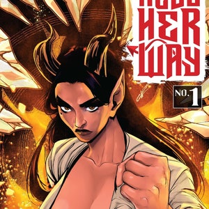 May include: Comic book cover featuring a woman with horns and a white shirt, against a background of orange and yellow flames. The title "Hell Her Way" is in red letters and the number "1" is in a circle. The text "Saltara Comics" is at the bottom of the cover.