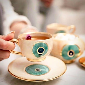 Handgemachte Evil Eye Keramik Tasse und Untertasse Set - mit 11k Gold überzogenen Kanten