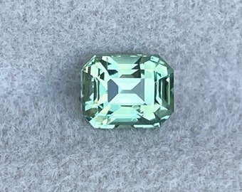 natural green sapphire gemstone Montana dark & light 0.98 ct. Emerald cut green sapphire pale mint and olive green for sale