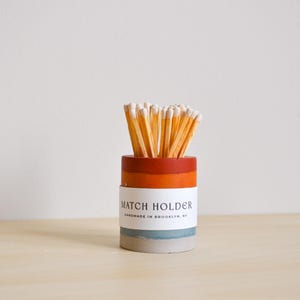 Handmade Layered Rainbow Concrete Match Holder with Match striker and match bundle