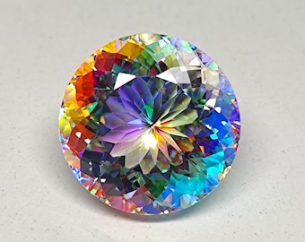 May include: A round, faceted gemstone with a rainbow of colors, including red, orange, yellow, green, blue, indigo, and violet. The gemstone is cut in a starburst pattern, with a central point that reflects light.