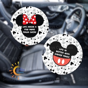 May include: Two round car coasters with a black and white polka dot background. One coaster features a red and white polka dot bow on a black silhouette of Minnie Mouse with the text "Life needs a few more polka dots!" The other coaster features a black silhouette of Mickey Mouse with the text "Life is better with Disney magic!"