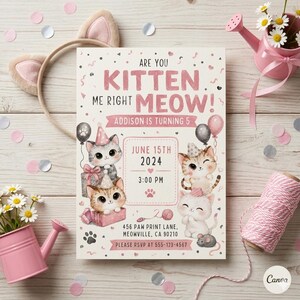 May include: A pink and white kitten-themed birthday invitation with the text "Are you Kitten Me Right Meow!" and "Addison is turning 5". The invitation features illustrations of cartoon kittens, balloons, and paw prints. A pink cat ear headband is also visible.