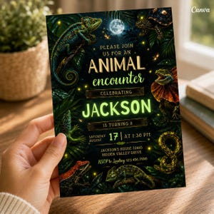 May include: A dark green invitation card with illustrations of reptiles and a full moon. The text reads "ANIMAL encounter" and "JACKSON" with event details. The invitation is held by a hand.