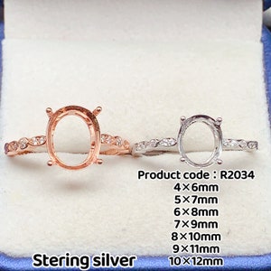 Puede incluir: Dos anillos de plata de ley con engastes ovalados y una fila de pequeñas piedras transparentes. Los anillos están disponibles en tamaños de 4x6mm a 10x12mm. Código de producto: R2034.