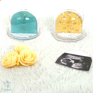 Boule à neige personnalisée annonce naissance c'est une fille ou un garçon
