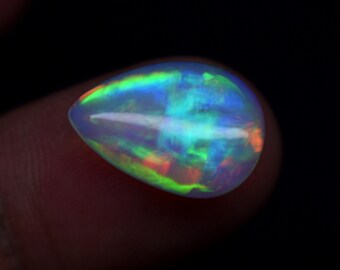 3.70 Carat Galaxy Fire Natural Ethiopian Opal Gemstone Pear Shape Cabochon, Opal Gemstone Size 15.5X11X4.5 mm.