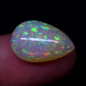 AAA+ Pear Ethiopian Opal: Honeycomb Dotted Gemstone (5.90 Ct)