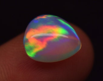 3.70 Carat Galaxy Fire Natural Ethiopian Opal Gemstone Pear Shape Cabochon, Opal Gemstone Size 12x10.5x6.6 mm.