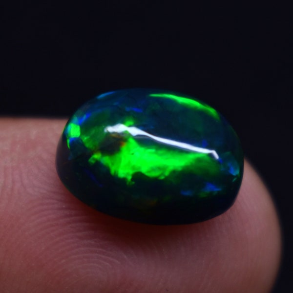 Natural Ethiopian 3.5 Carat Multi Fire, Size 12.5x9.5x5.9 MM, Black Smoked Opal Oval Shape Cabochon Gemstone, For Making Jewelry.