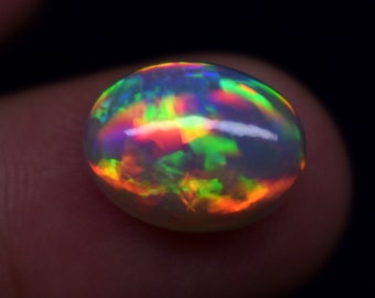 Exclusive Fire Natural Ethiopian Opal Oval Shape 3.40 Carat Ethiopian Opal Cabochon Gemstone Size 12.5X9.5X5.8 mm