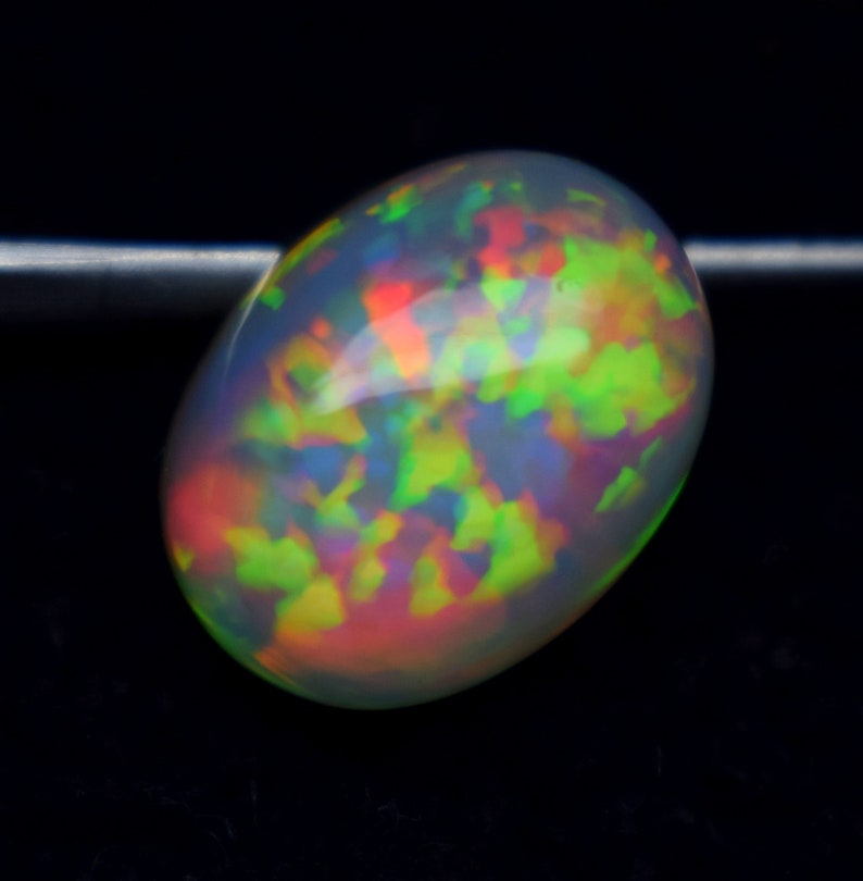 Rainbow Fire Opal Size 15.2X11.4X5 MM Opal A++ Smooth Oval Shape Opal Gemstone Quality Opal. Natural Ethiopian Opal Cabochon Rainbow Fire Opal Size 15.2X11.4X5 MM Opal A++ Smooth Oval Shape Opal Gemstone Quality Opal. Natural Ethiopian Opal Cabochon