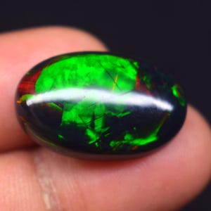 AAA++ Multi Fire Natural Ethiopian Opal Gemstone, 9.55 Carat Black Smoked Opal Oval Shape Cabochon Size 23.3X14.1X6.1MM Opal Gemstone.