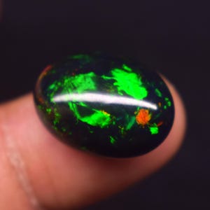 Multi Fire Natural Ethiopian Opal Gemstone, 8.75 Carat Black Smoked Opal Oval Shape Cabochon Size 19.5X14.4X7.3 MM Opal Gemstone.