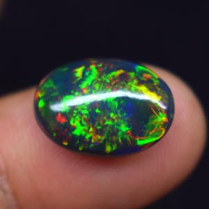 Ethiopian Black Opal Cabochon: Multi-Fire Gemstone (5.8 Ct, 15.6x10.2mm)