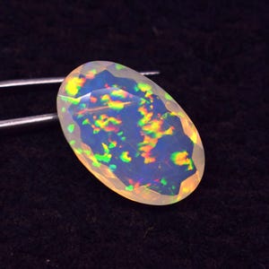 16.1 Crt Natürlicher Äthiopischer Opal Edelstein: AAA Oval Facettierter Feueropal
