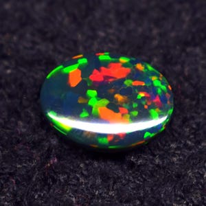 Top Quality Multi Fire 4.70 CT Natural Ethiopian Opal Black Smoked Cabochon 15.2X12.4X4.6 mm Oval Shape Opal Gemstone Jewelry Making