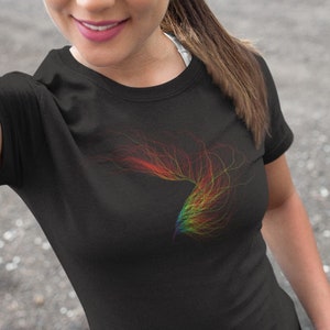May include: A black t-shirt featuring a rainbow-coloured abstract design on the front. The design resembles a stylised bird with its wings spread.