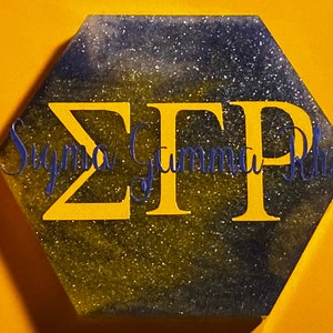 Sigma Gamma Rho, Paraphernalia, Badge Holder