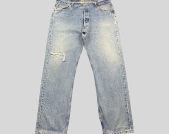 Jeans Levi’s 501 azules vintage de los 90, hechos en EE. UU., cierre de botones, lavado claro, mezclilla desgastada, 1997, pierna recta, talla W38 L31 para hombre. Auténticos jeans Levi’s.