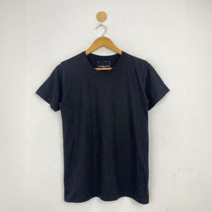 NUMBER (N)INE Black Graphic T-Shirt | Unique Character Print | Unisex Size Small | Premium Cotton Blend | Minimalist Streetwear Fashion