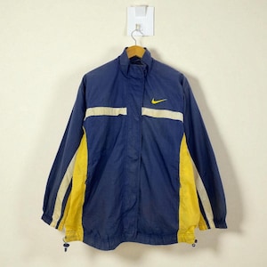 Vintage 90s Nike Blue and Yellow Windbreaker Jacket - Retro 90s Sporty Design, Unisex Size Medium, Zip Pockets, Classic Athletic Style