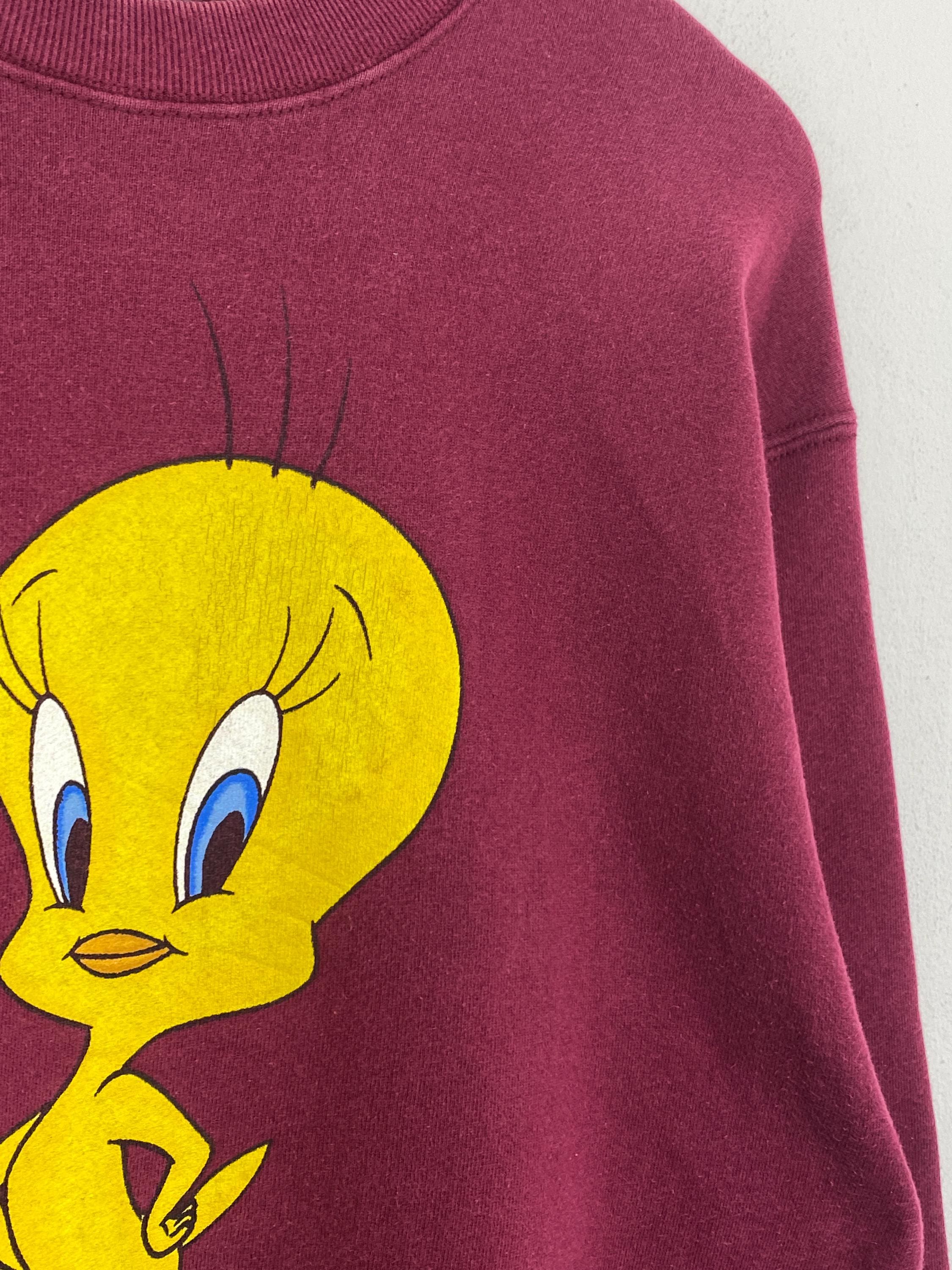 Tweety×Sylvester Design Sweat Tops Amazon.com: Looney Tunes Cute Tweety Bird Holding A Flower Logo
